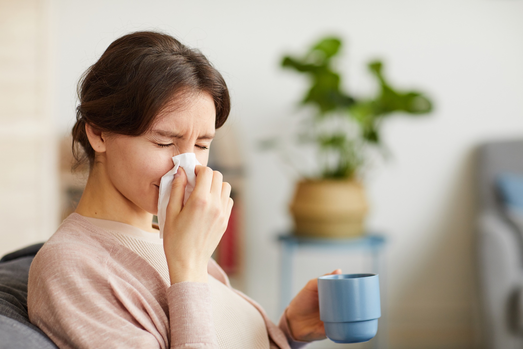 Woman has a running nose